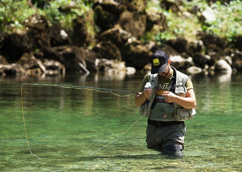 Fisherman in a river