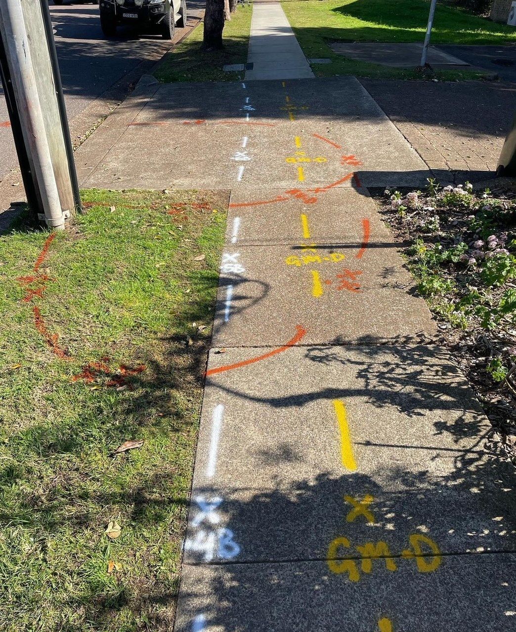 A sidewalk with the number 48 painted on it