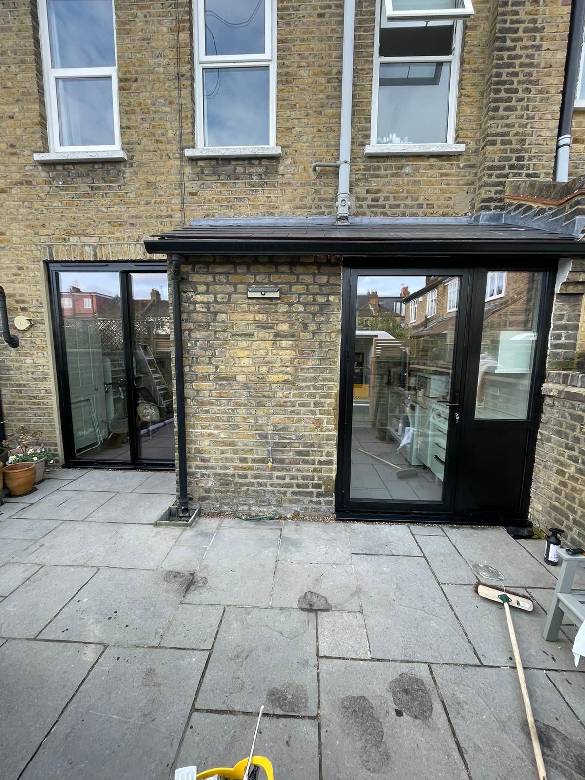 Kitchen and Living room doors. Corvision double slider + Cortizo single door with side panels