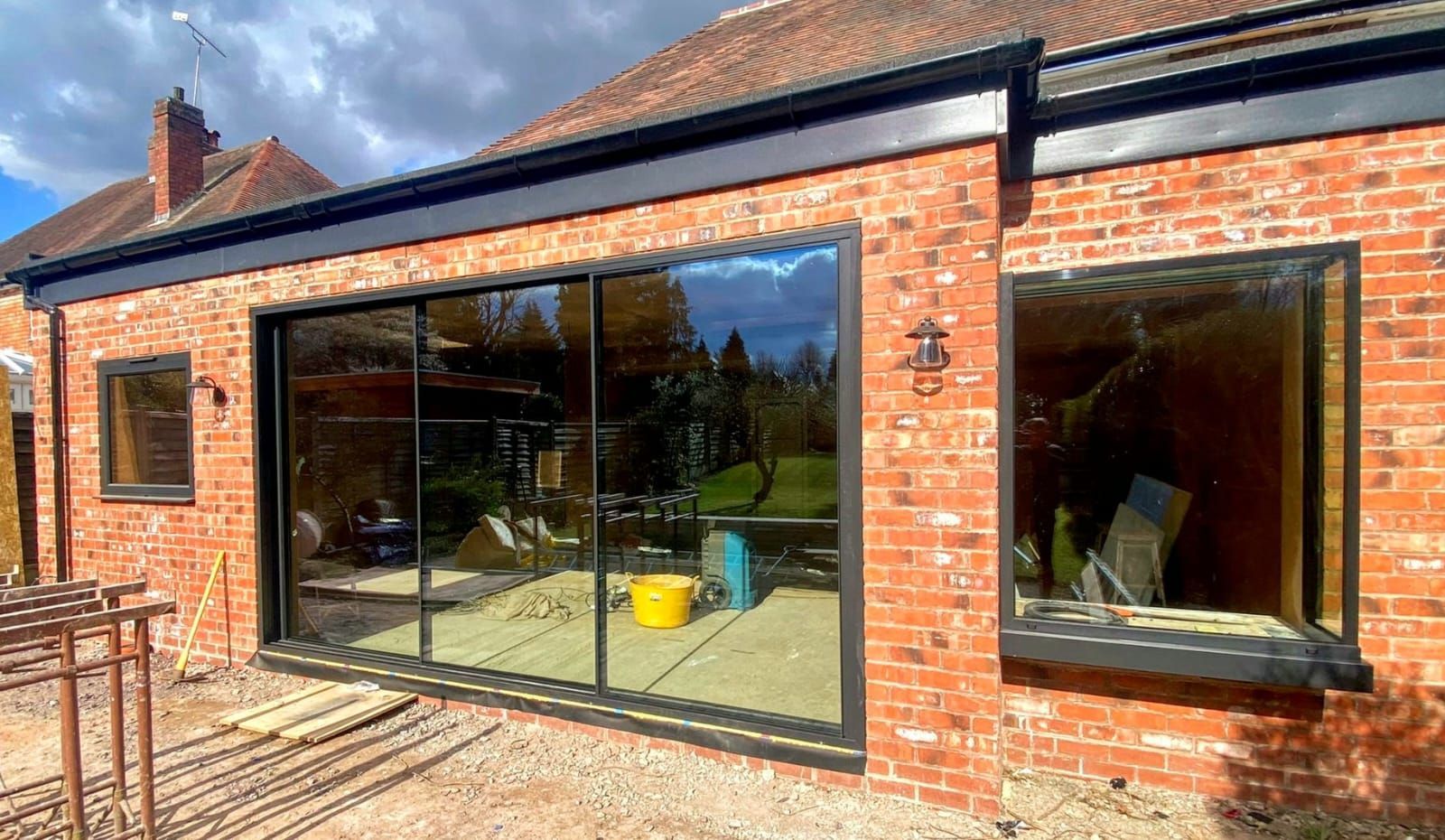 Corner oriel bay window / glass box with corvision slider and fixed unit