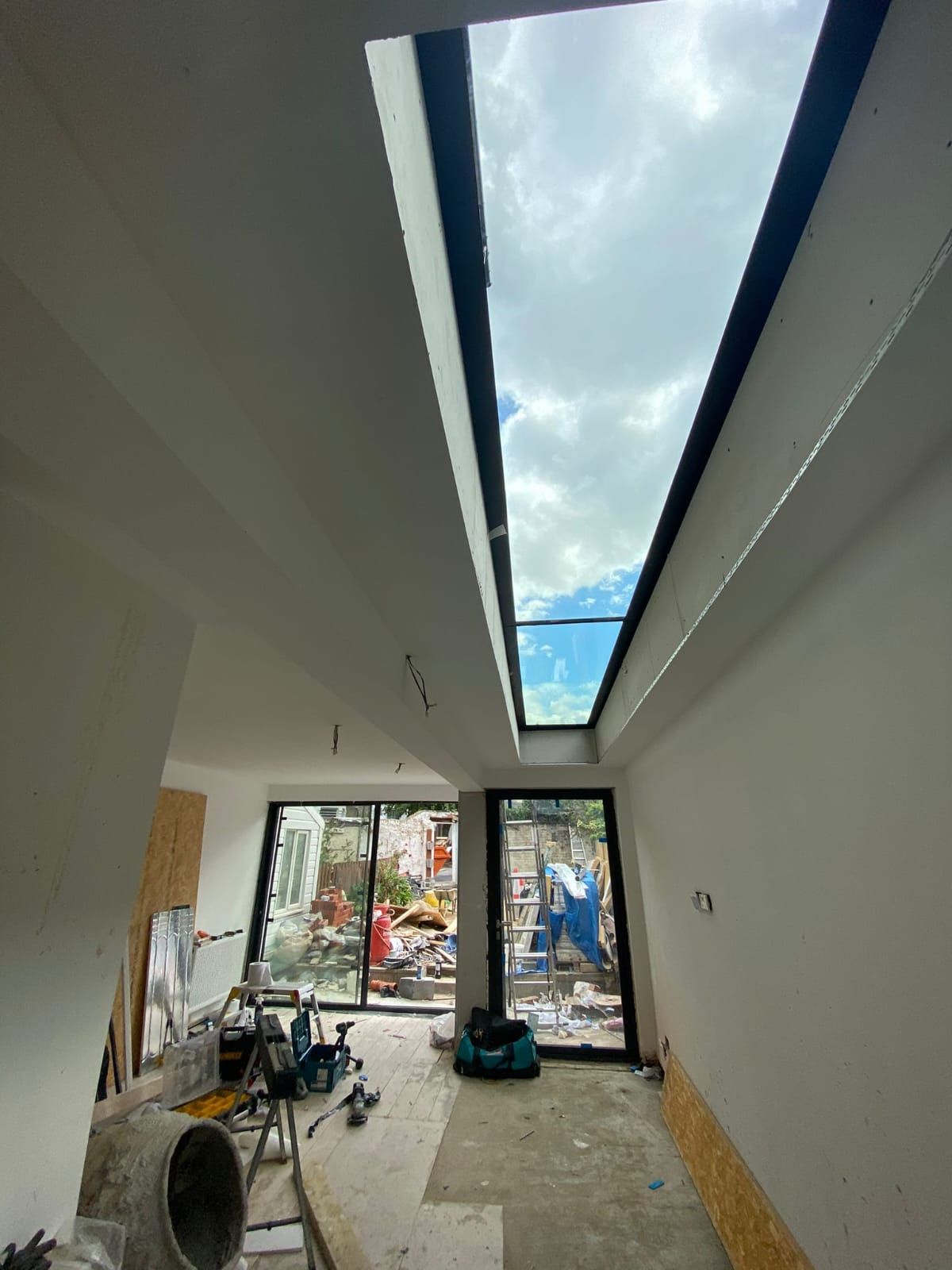 Frameless Rooflight with Slimline doors and window