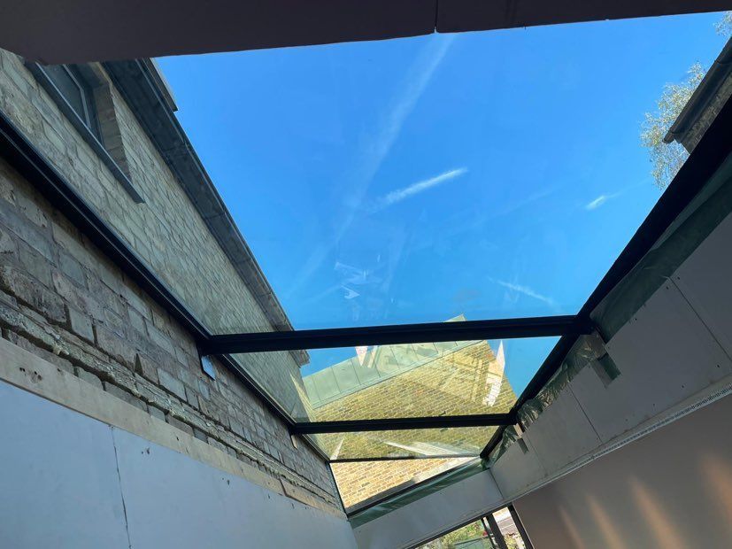 Internal of Frameless glass roof with T sections