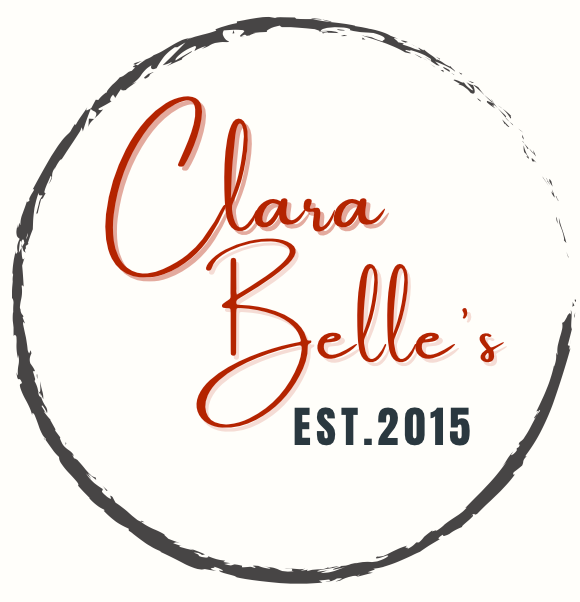 Logo for Clara Belle's with cursive text in red, surrounded by a gray circle; 