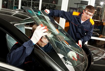 Two Men Replacing Auto Glass — Jonesboro, IL — Duty’s Auto Glass