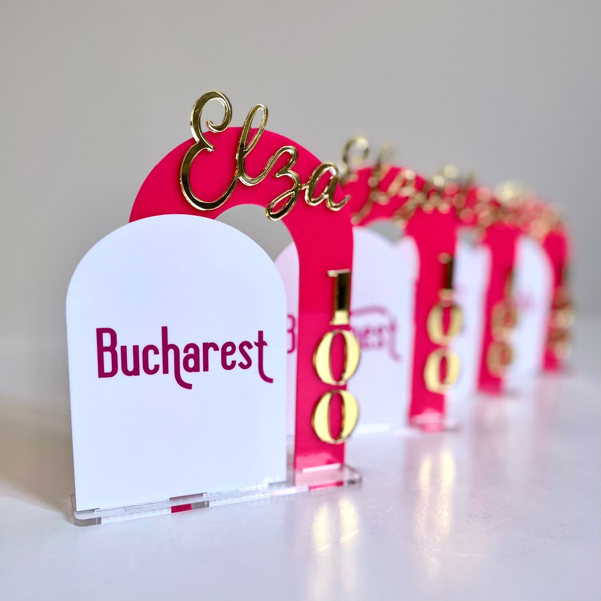 A row of place cards with bucharest written on them