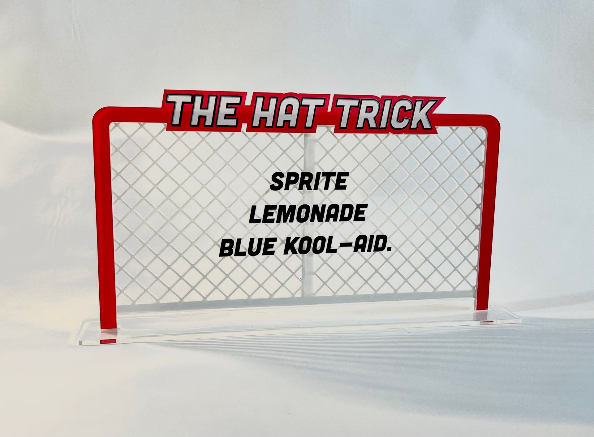 A sign that says the hat trick sprite lemonade blue kool aid