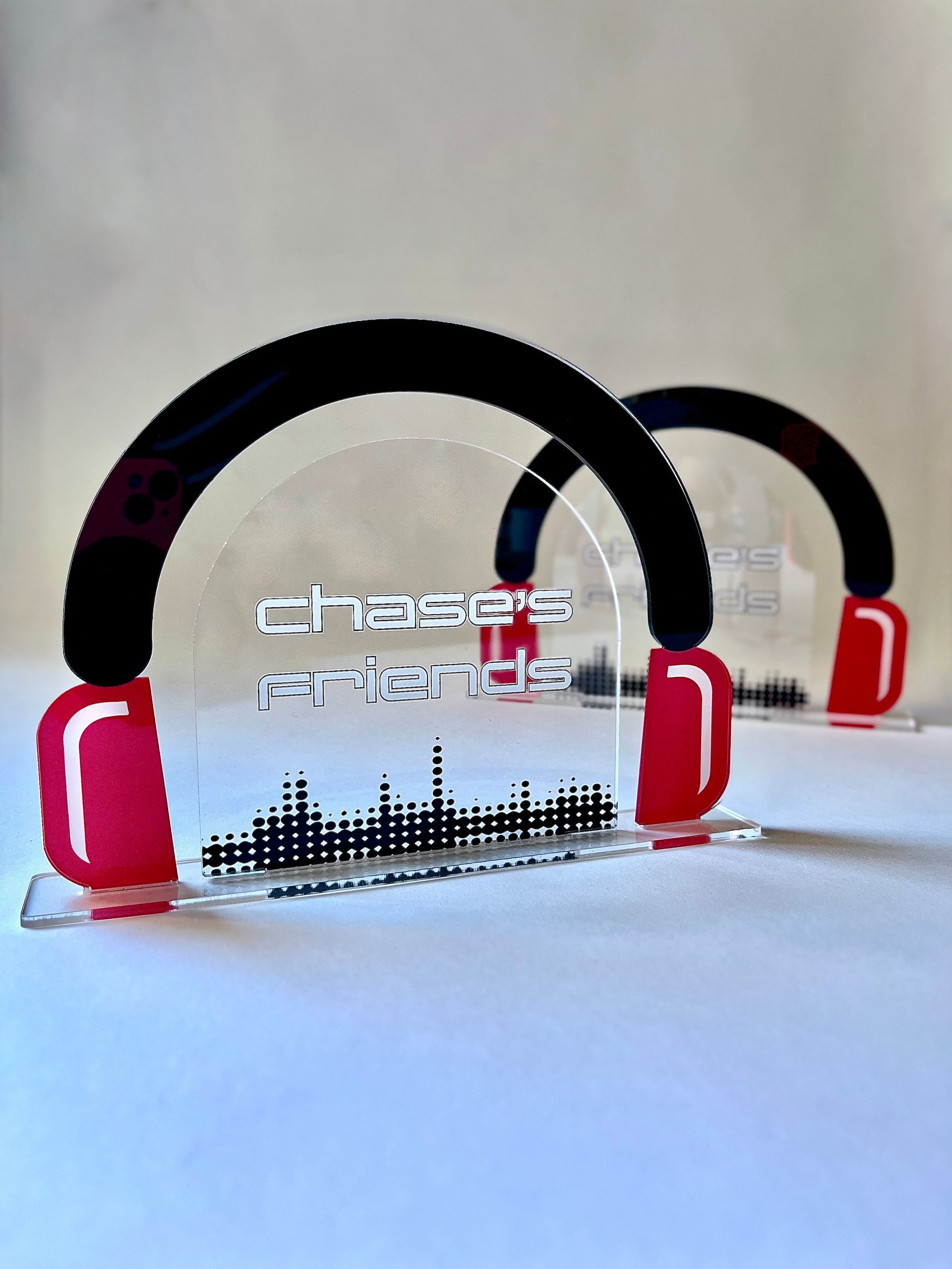 A pair of headphones with the word chase written on them