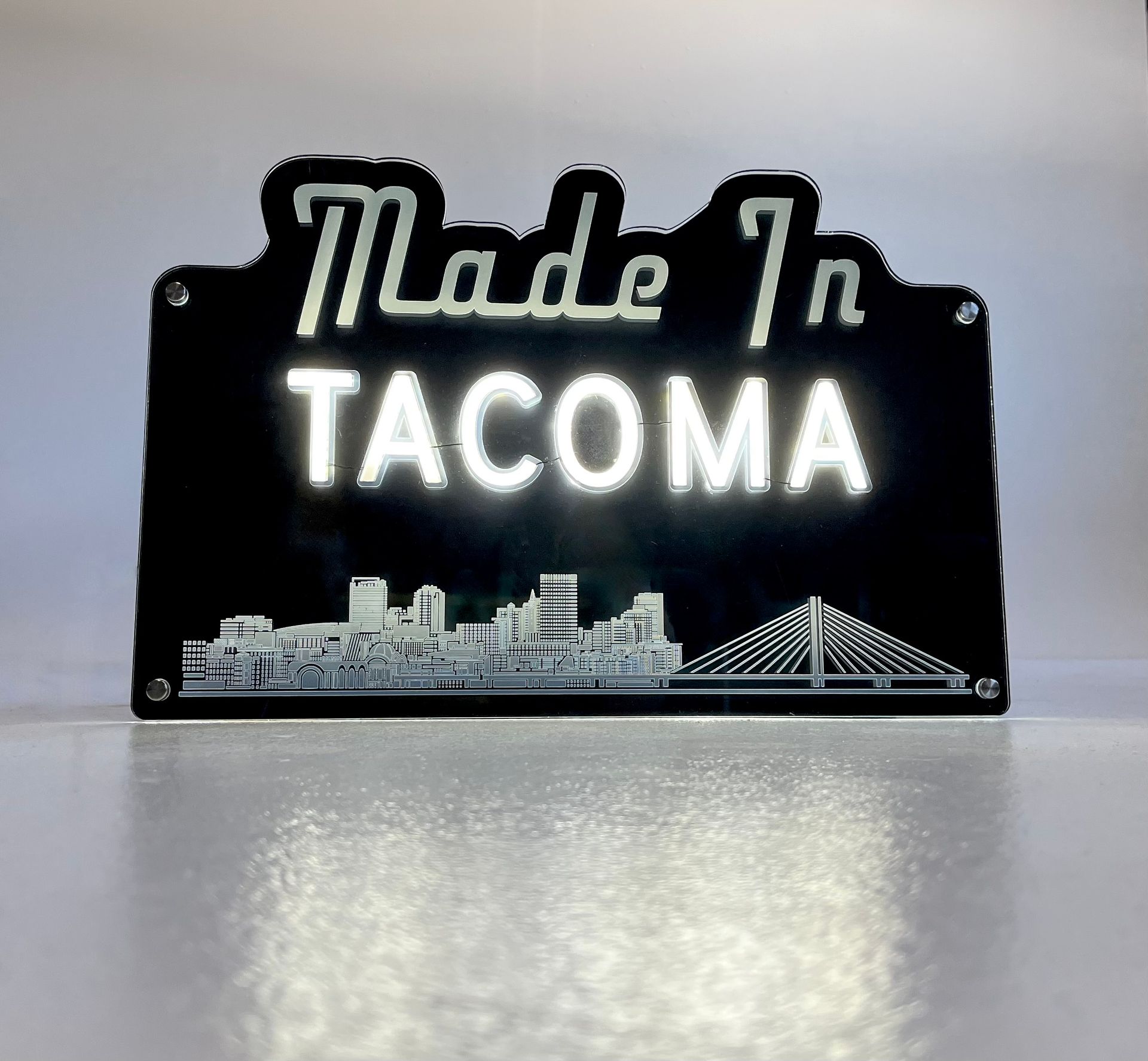 A sign that says made in tacoma on it