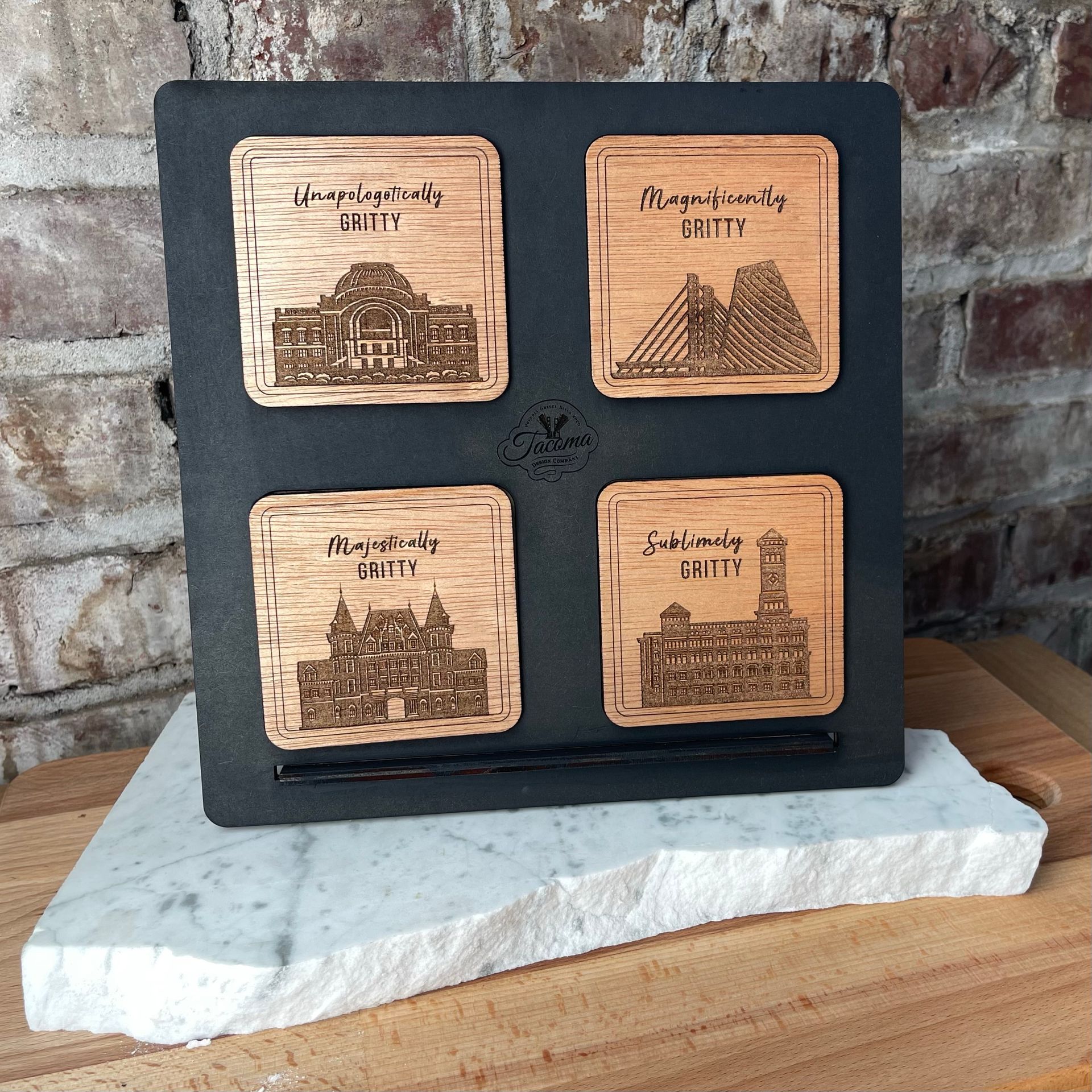 A black box with four wooden coasters on it