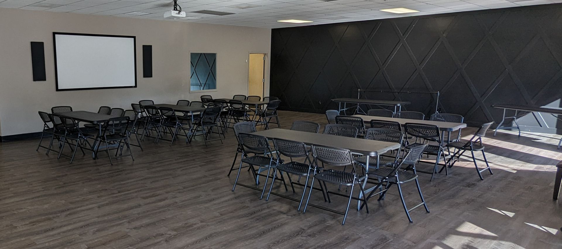 Venue showing tables and chair without decorations