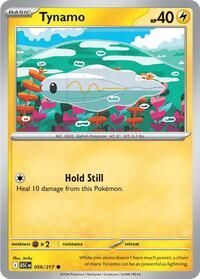 Een Tynamo Pokémon-ruilkaart met 40 HP, waarop het visachtige wezen te zien is dat onder water tussen kleurrijke planten zwemt.