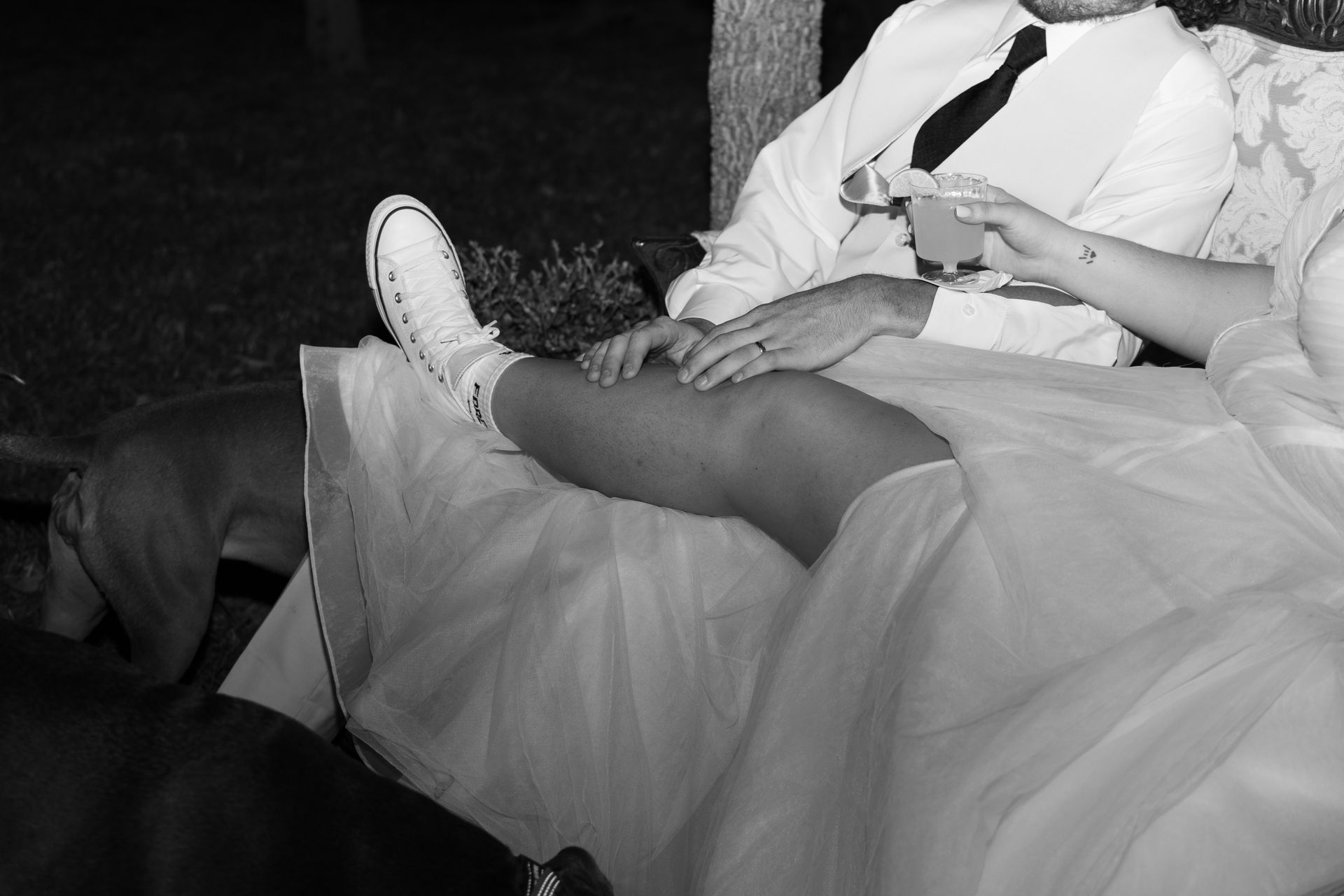 A black and white photo of a bride and groom