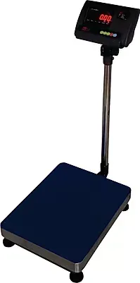 A digital scale is sitting on top of a blue table.