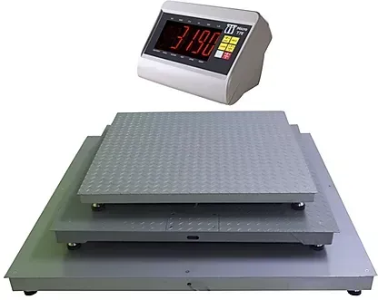A digital scale is sitting on top of a stack of metal scales.