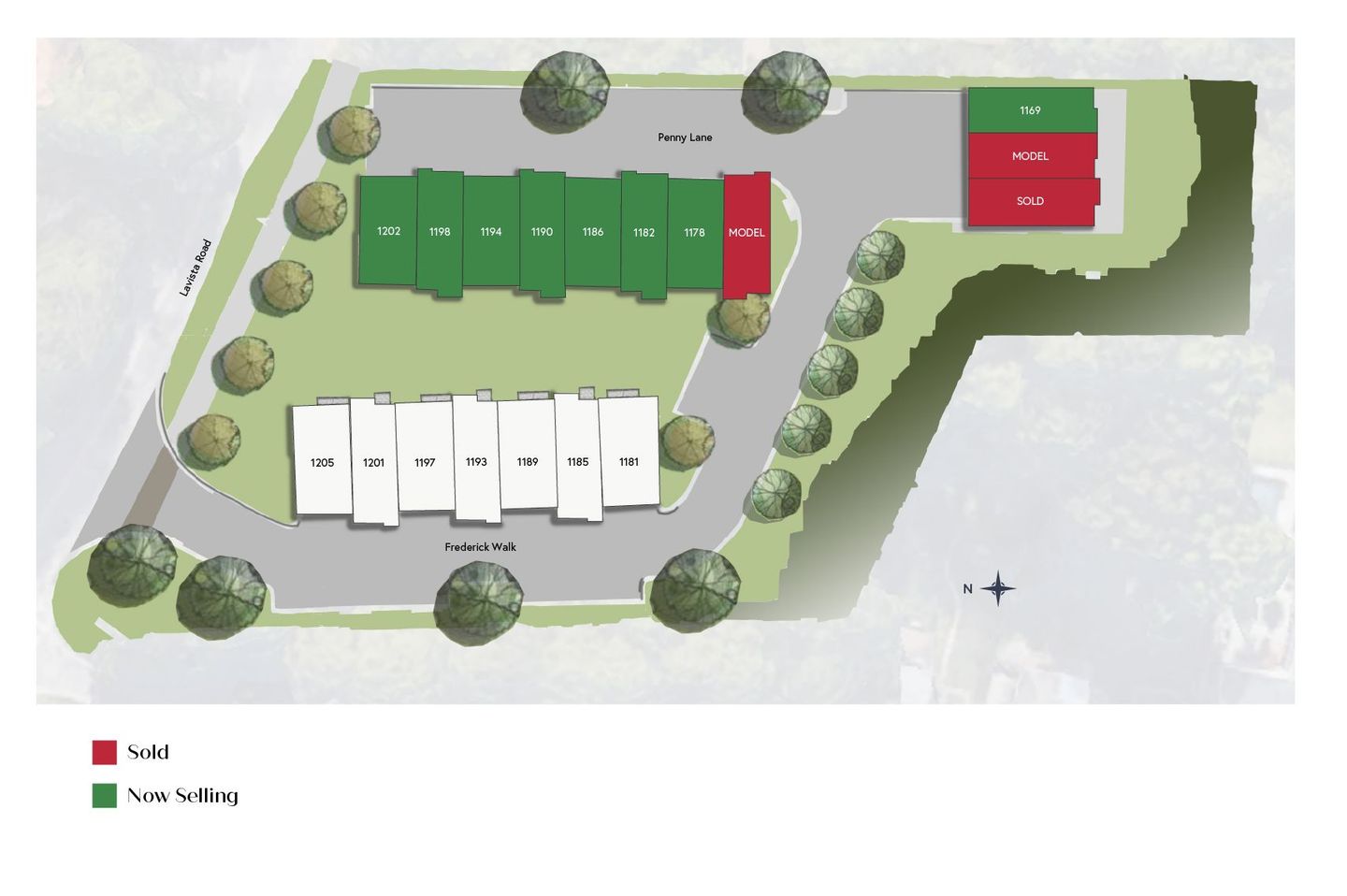 A site plan showing two rows of rectangular building footprints and a small separate structure, set among green trees.