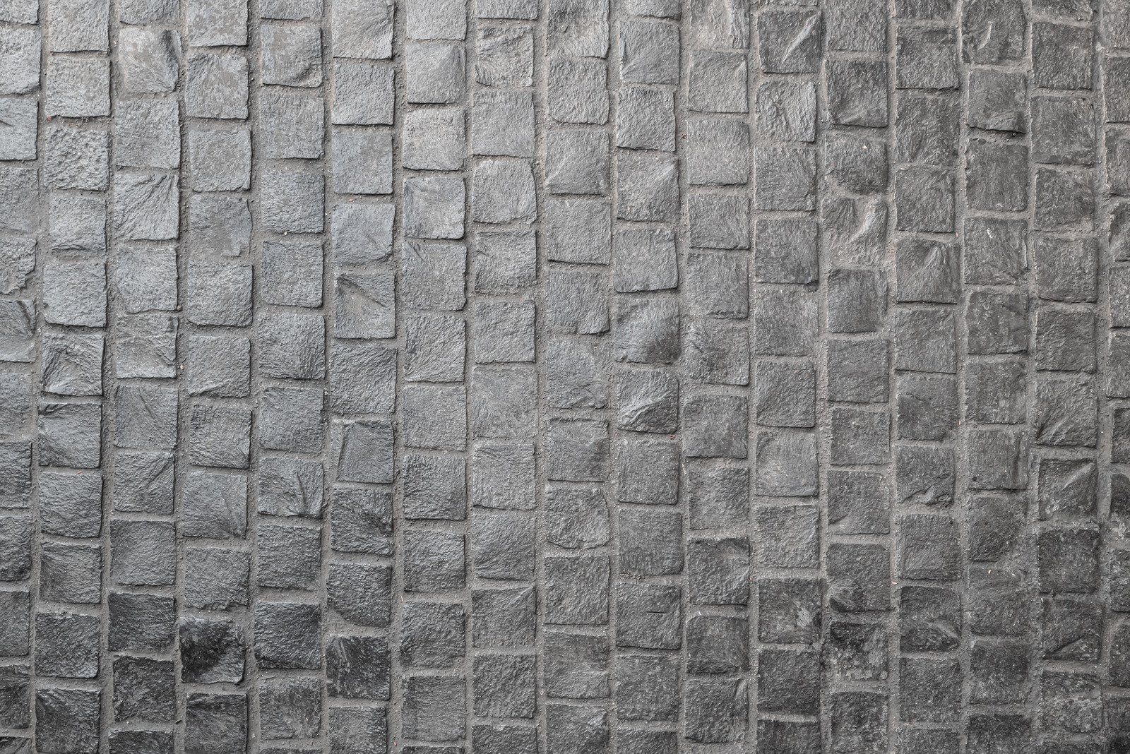 Gray cobblestone pavement.