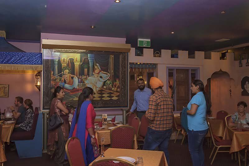 People enjoying food at Jaipur Palace