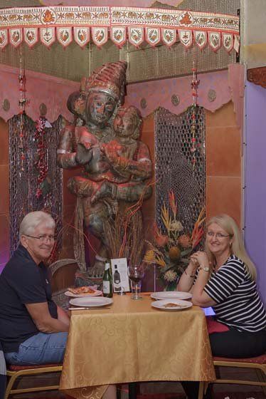 foreign couple enjoying food at Jaipur Palace