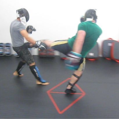 two fighter practicing muay thai