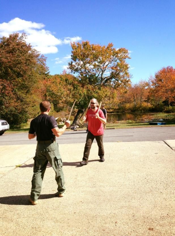a group of people are posing for a picture in a gym