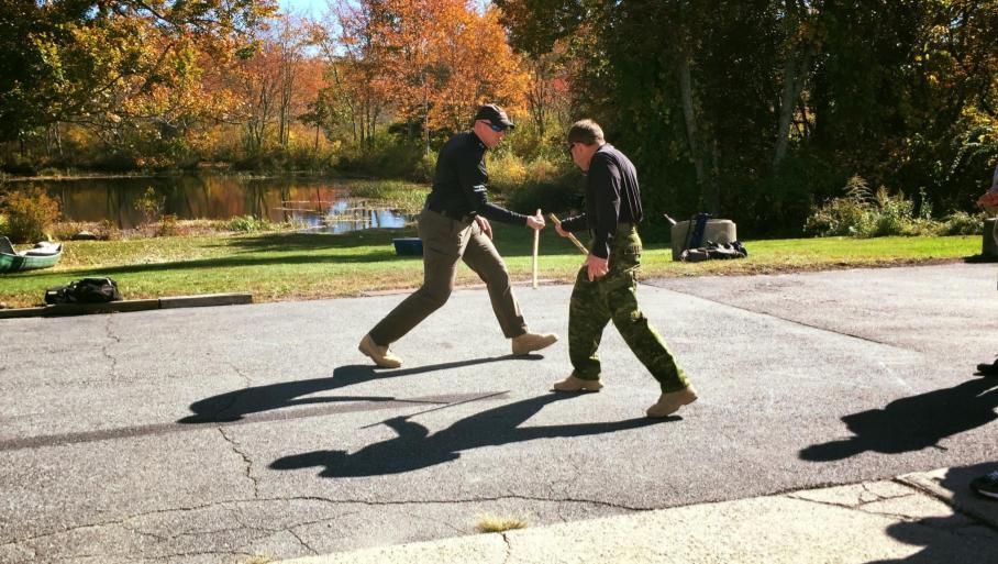 a man wearing a black shirt that says ocean star