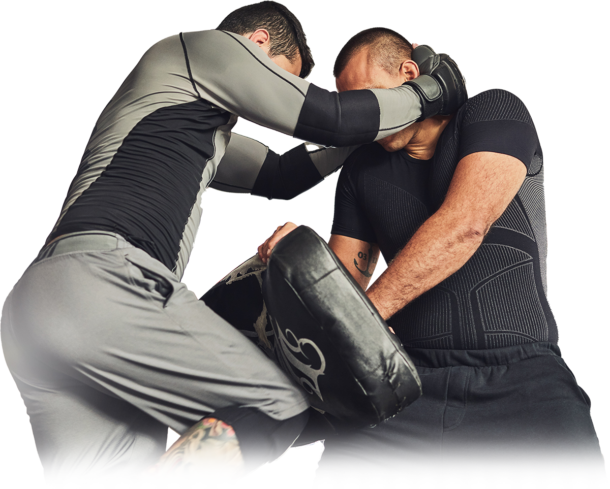 two men are fighting with a boxing glove on a white background .