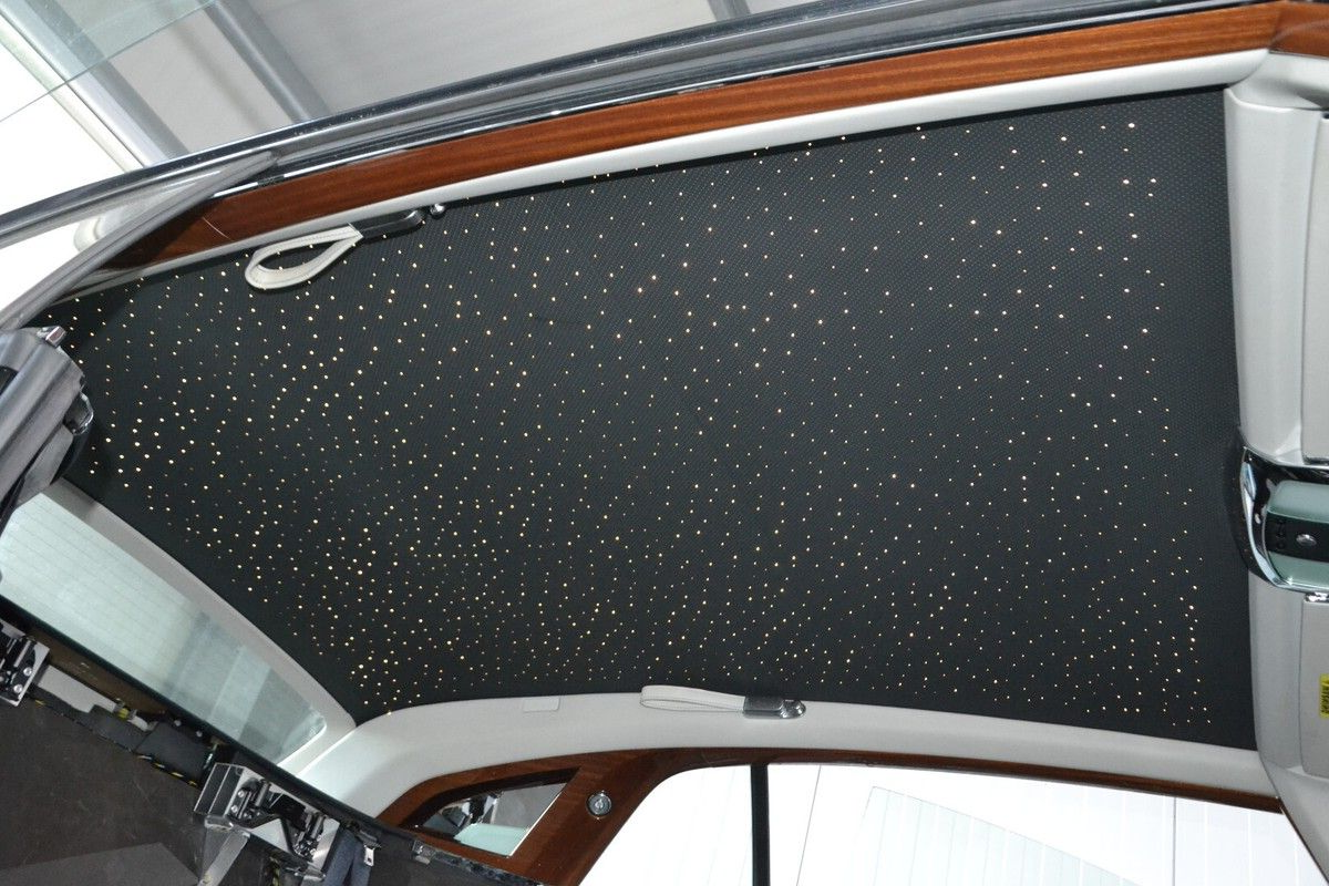 Luxury headliner with stars from a Rolls Royce cleaned to perfection.