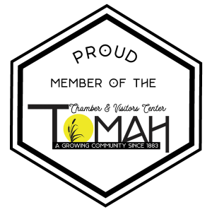Logo for the Tomah Chamber & Visitors Center, with text 