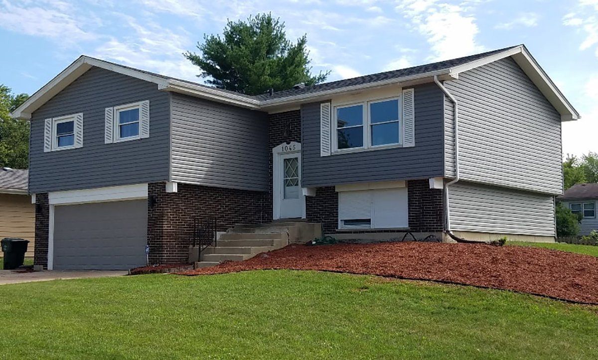 Residential House With Gray Siding — Manhattan, IL — All Coast Restoration LLC