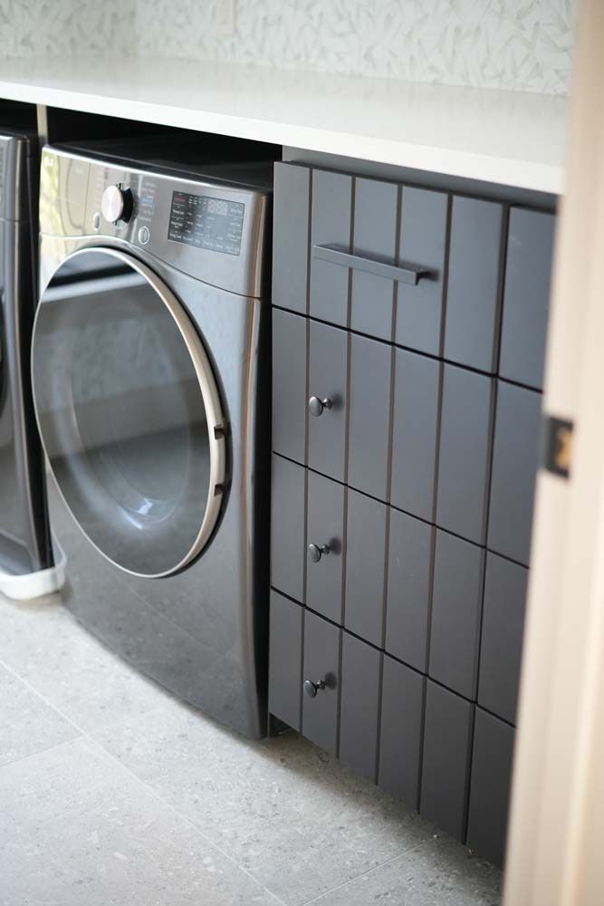There is a washer and dryer in the laundry room.