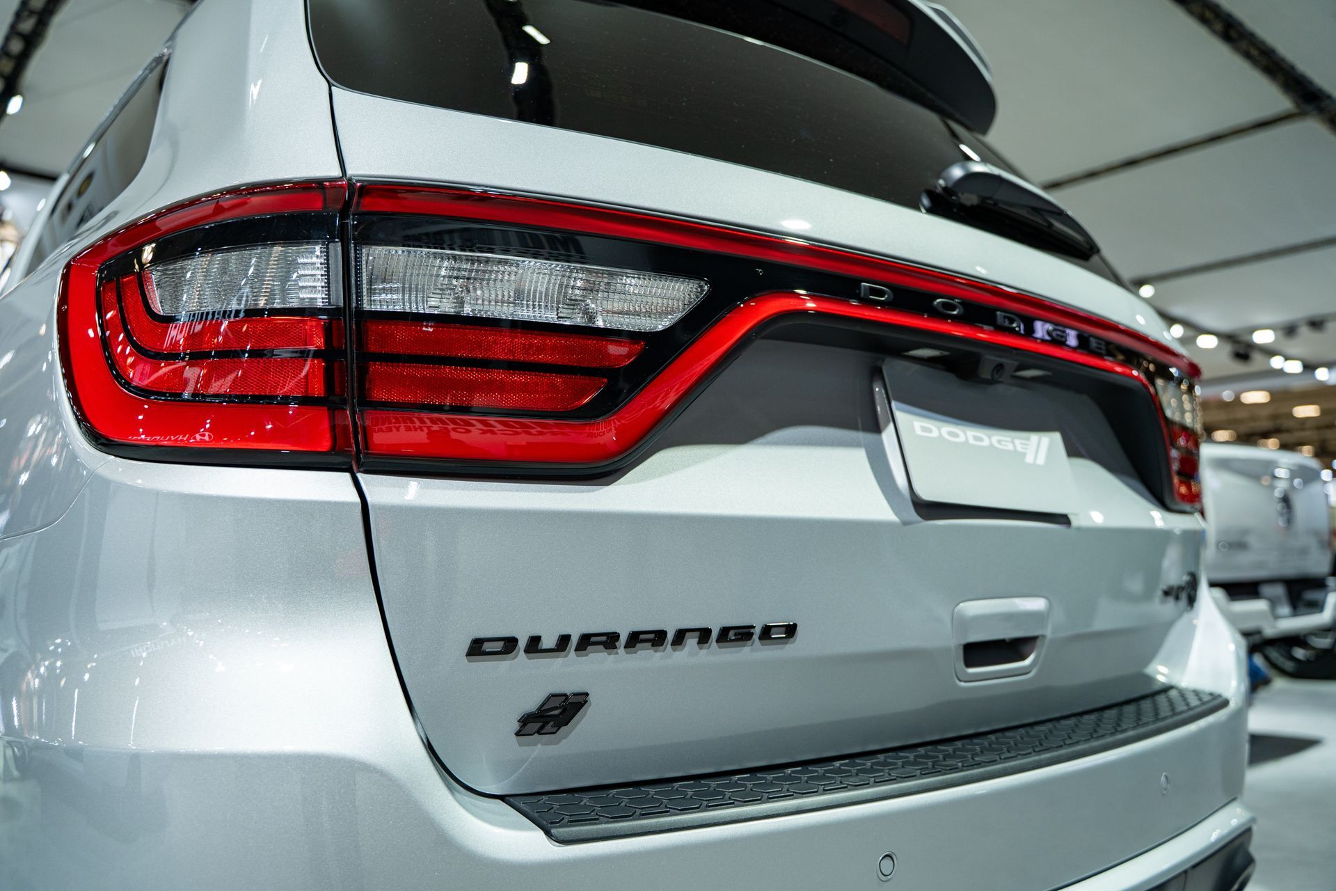 ceramic coated red durango srt parked in a garage