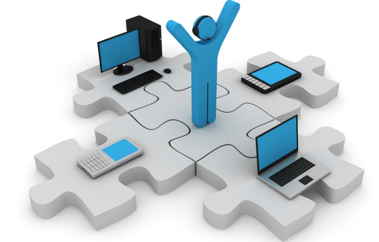 A blue figure is standing on a puzzle piece surrounded by computers