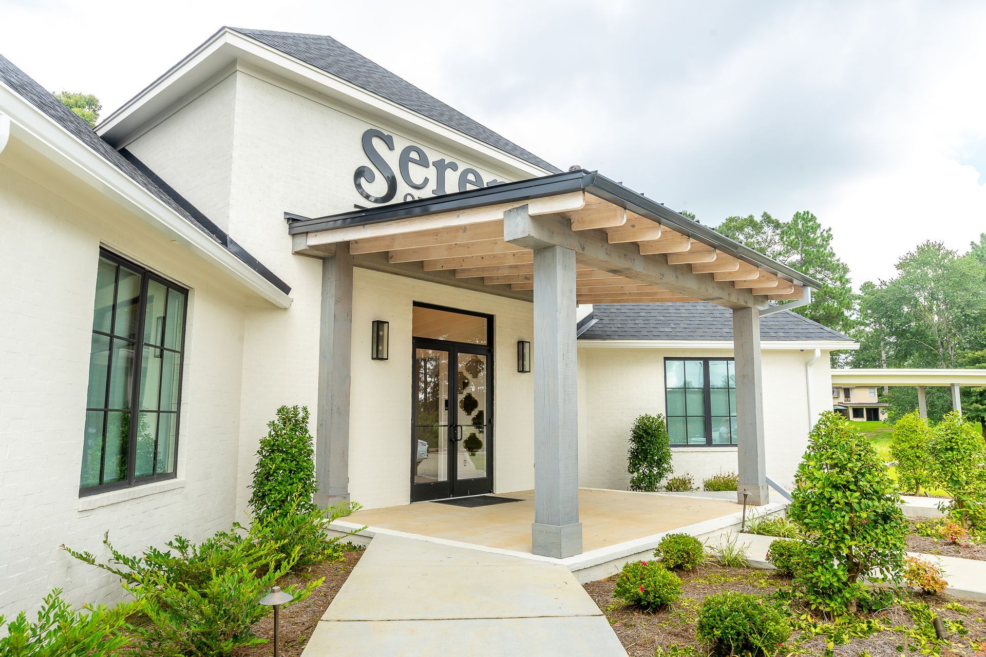 Woman Examining Little Girl | Hattiesburg, MS | Serene Oral Surgery