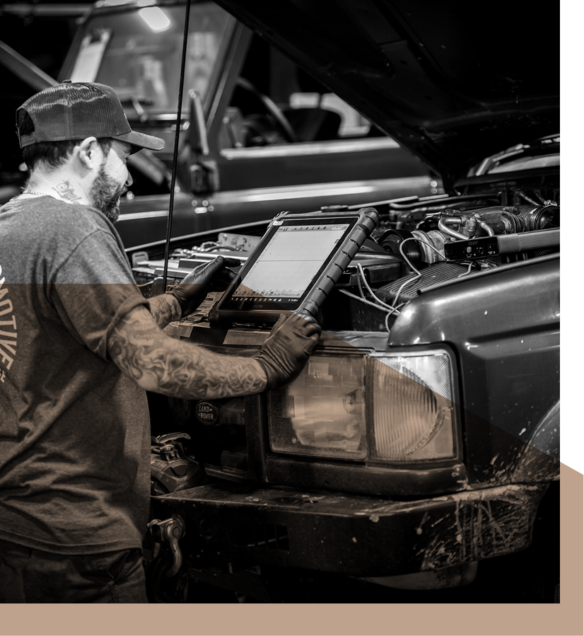 technician working | Artisan Autoworks