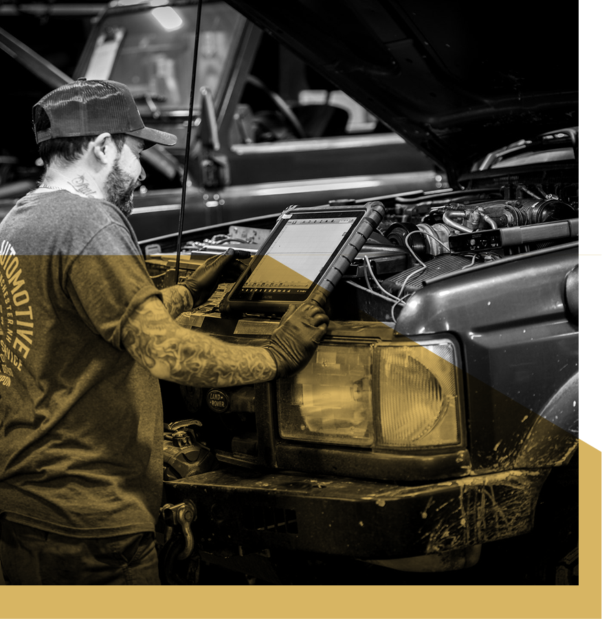 technician working | Artisan Autoworks