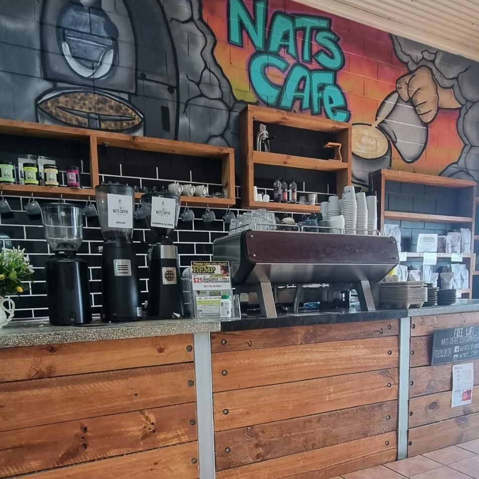 A Restaurant with A Mural on The Wall that Says Nat's Cafe — Nat’s Coffee in Alstonville, NSW