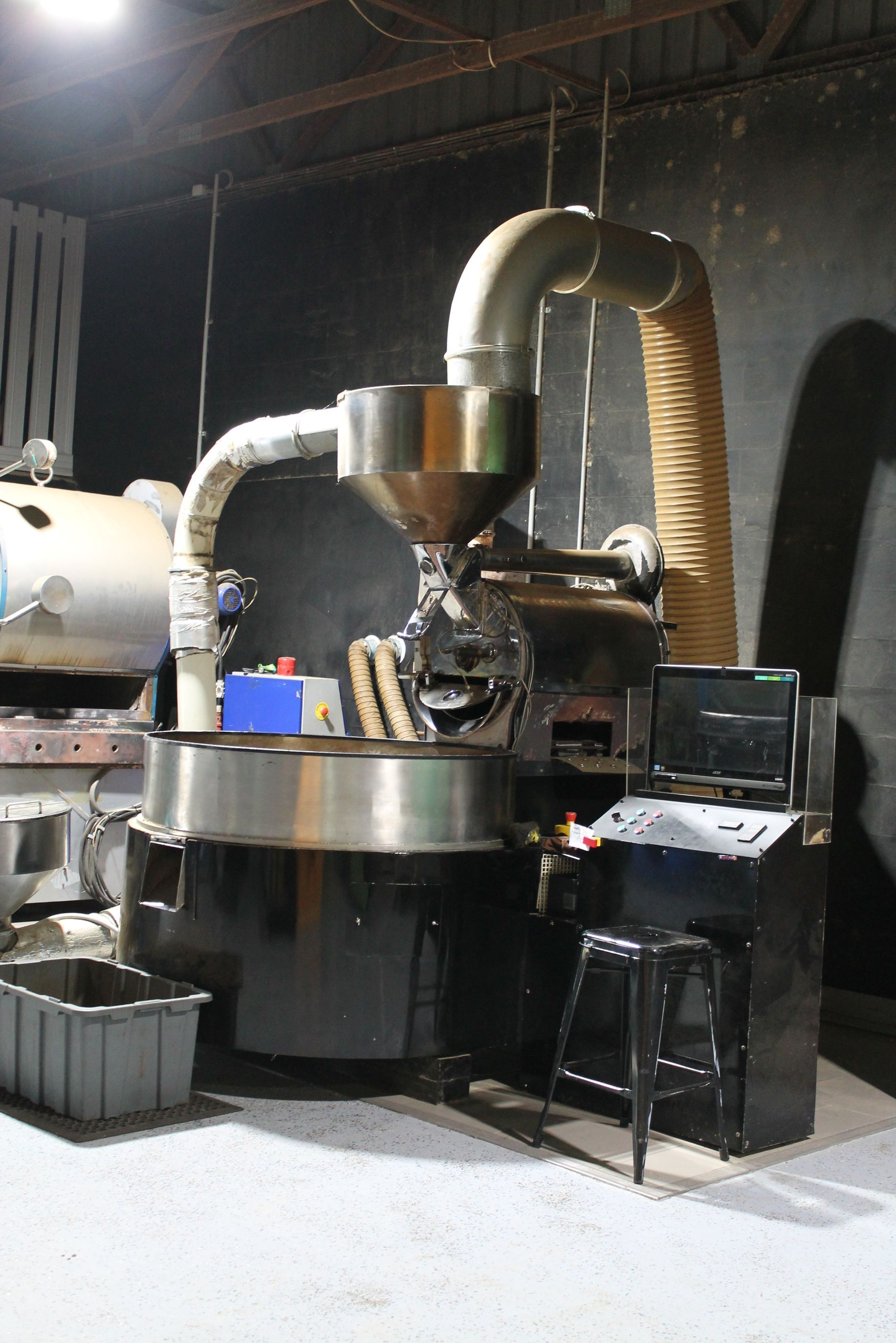 A large machine is sitting in a dark room.