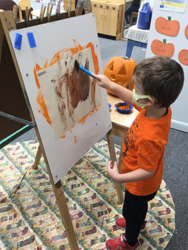Kid Painting Some Art — Parsippany, NJ — Carousel Of Learning, Early Learning Center & Child Care