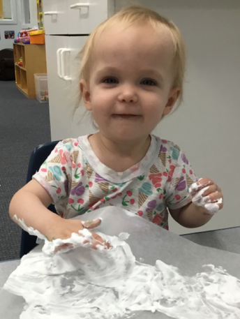 Infant Having Fun — Parsippany, NJ — Carousel Of Learning, Early Learning Center & Child Care