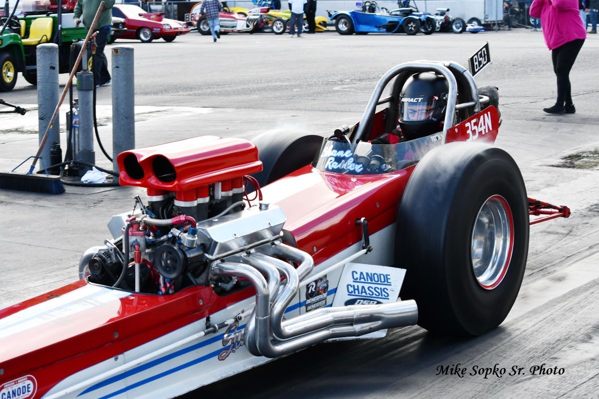 A red and white race car with the number 540 on the side