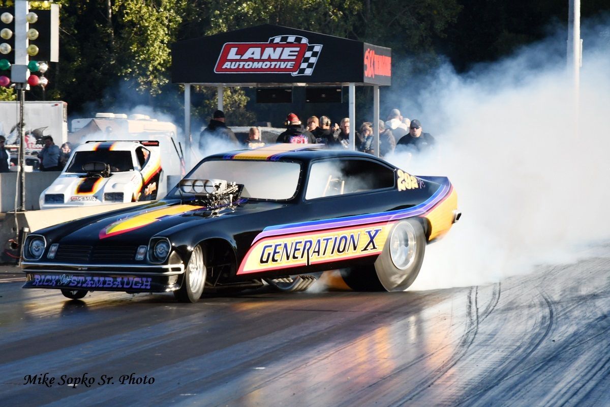 A racing car with the word generation x on the side