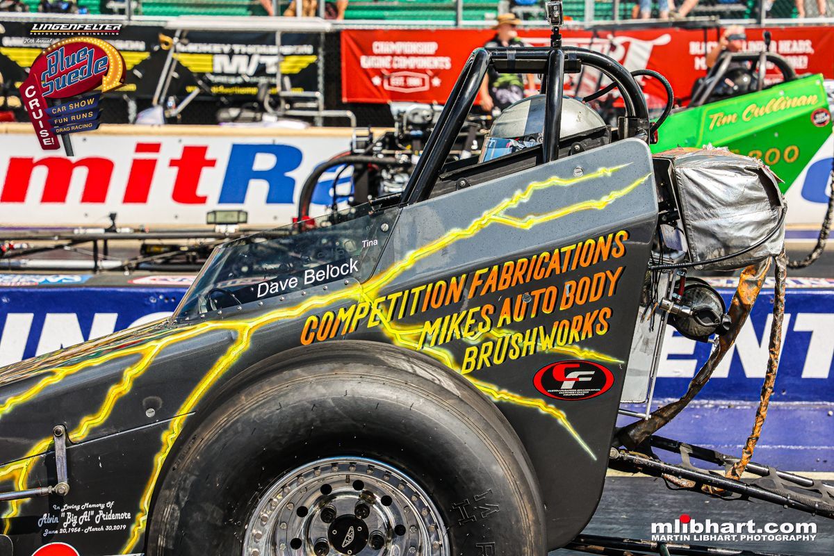 A race car with the word competition on the side