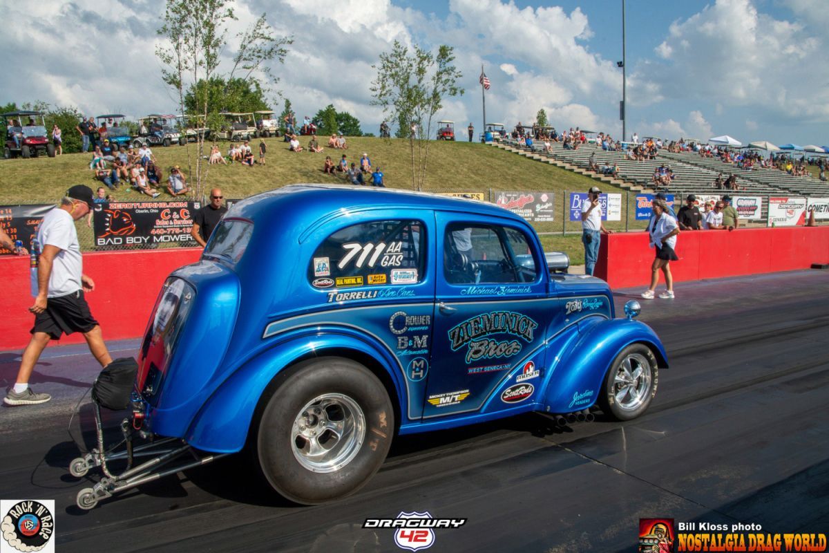 A blue car with the number 7 on the side