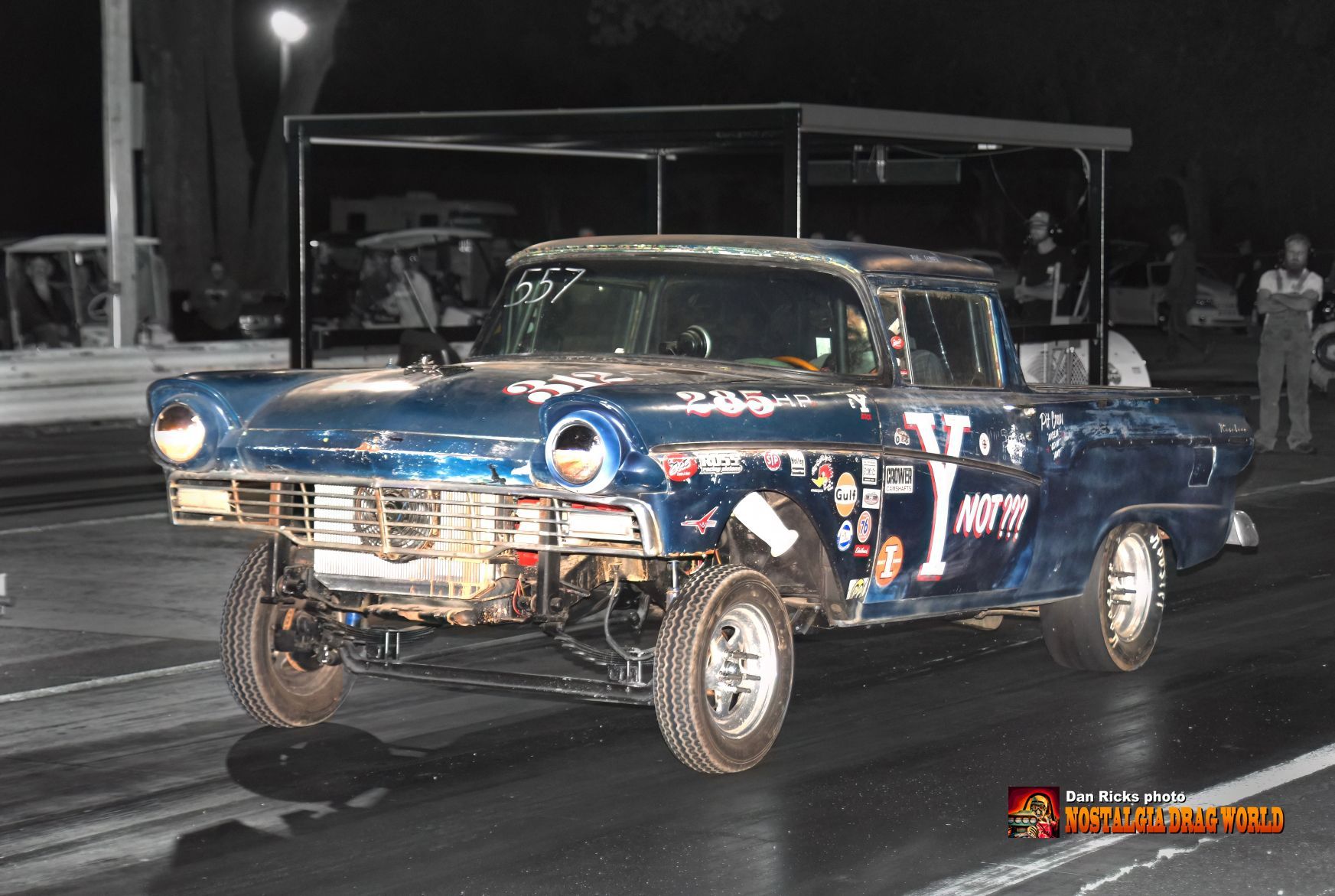 A blue car with the number 1 on it