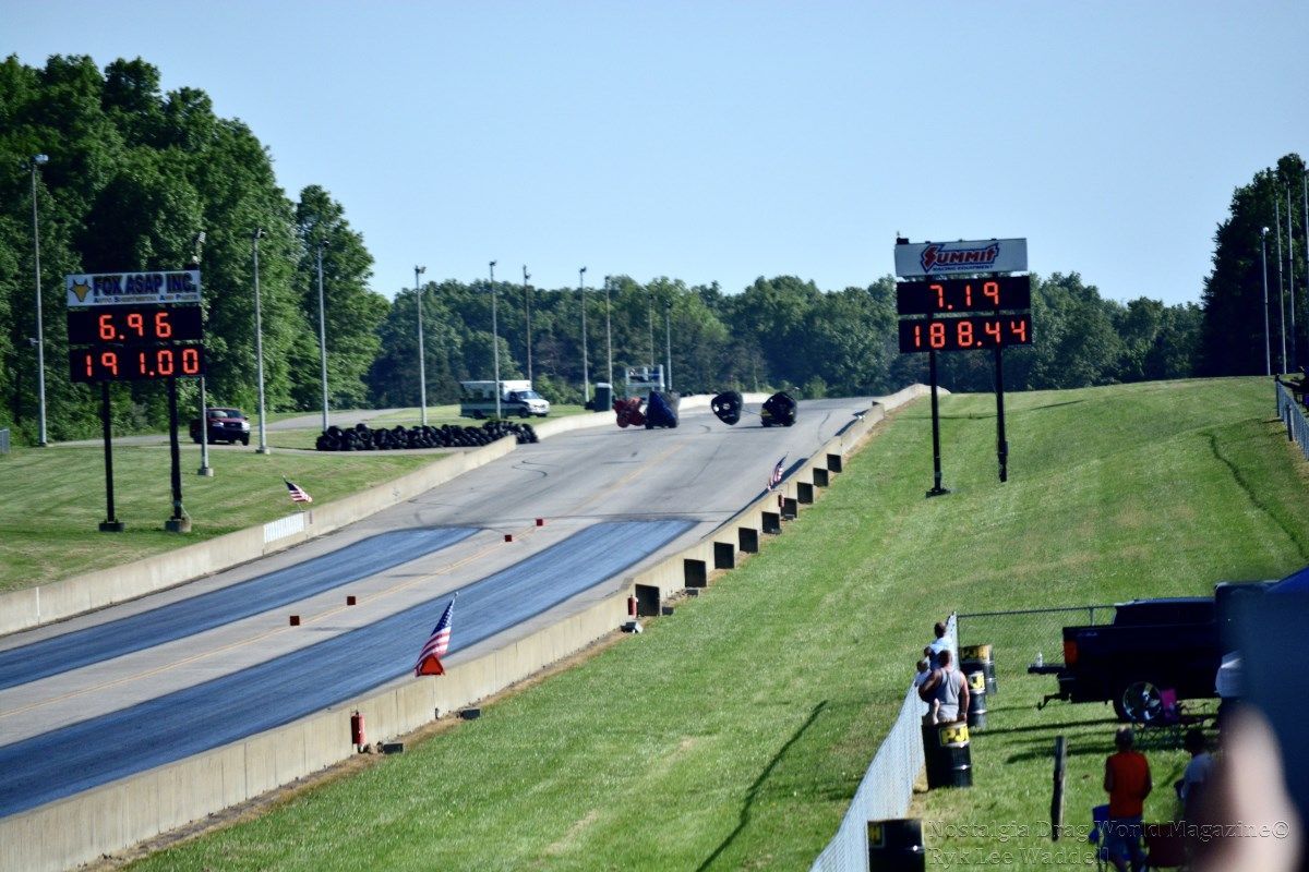 A race track with a bunch of cars on it