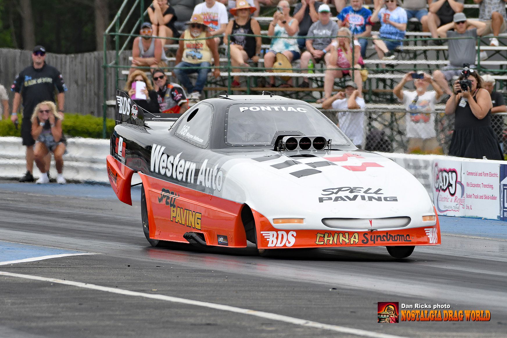 A race car with the word western auto on it
