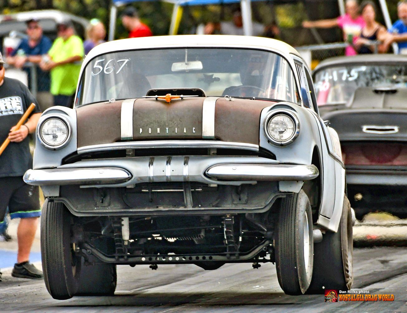 A car with the number 567 on the front of it