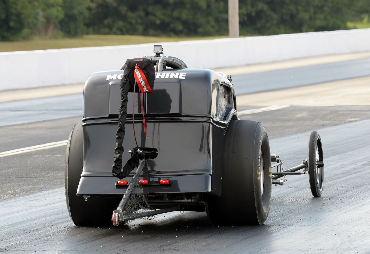 A race car with the word hine on the back