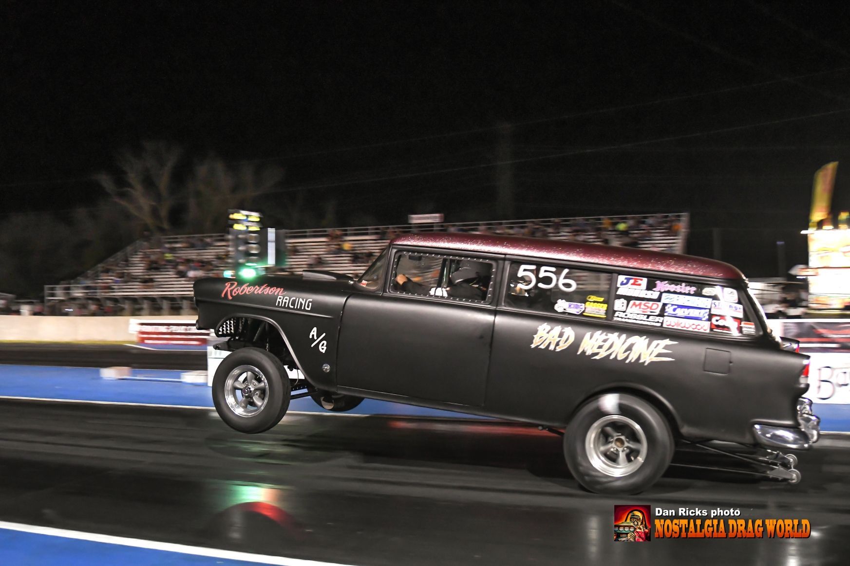 A black car with the number 556 on it