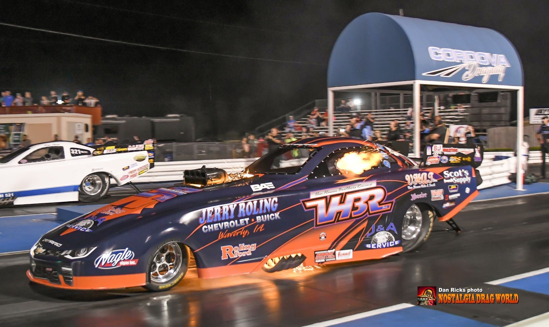 A race car with the word thr on it